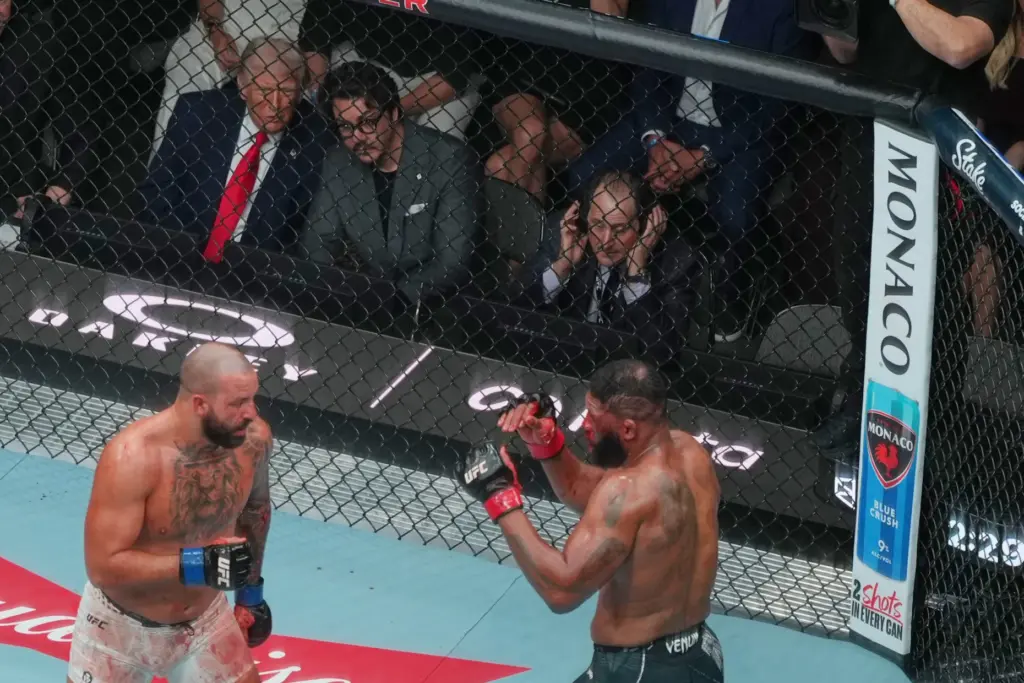 President Donald Trump and Hunter Campbell watch a fight during...