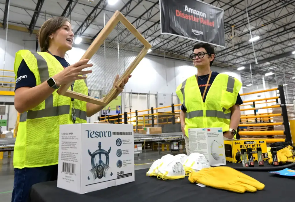 Sam Shockley, left, senior product manager for Amazonâs disaster relief...
