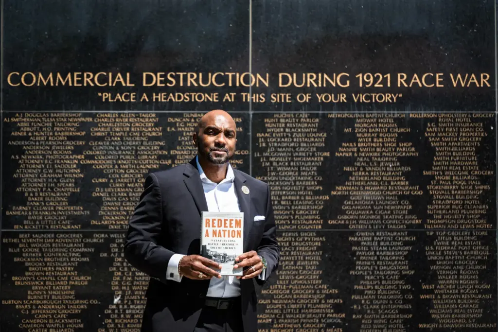Damario Solomon-Simmons poses for a portrait at the memorial for the 1921 Tulsa Race Massacre