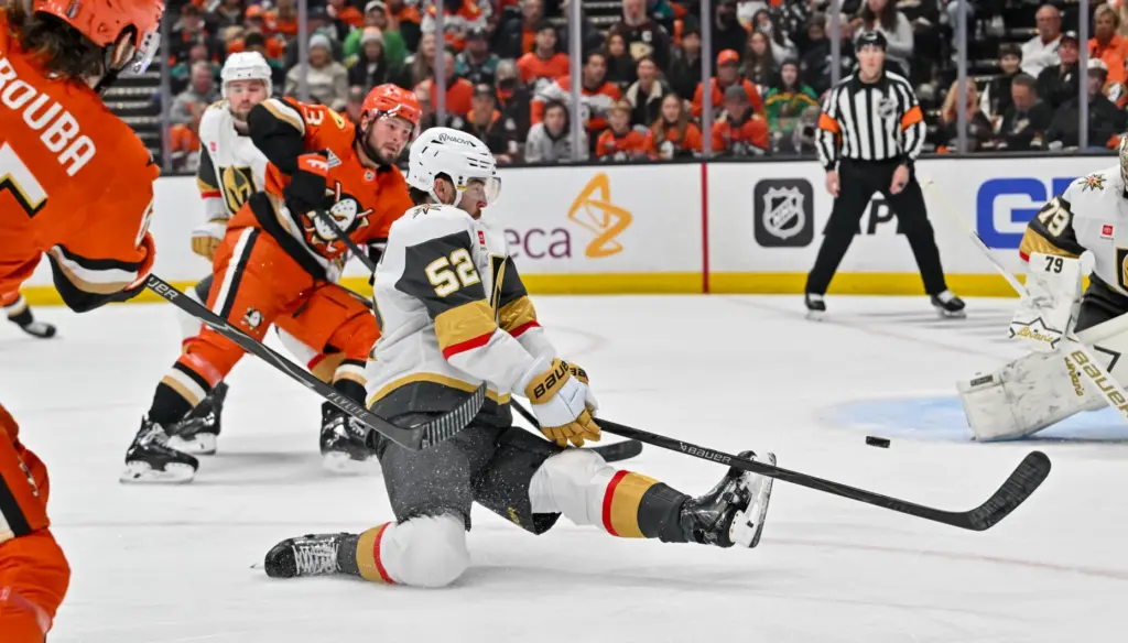 The Vegas Golden Knightsâ Dylan Coghlan (52) goes after the...