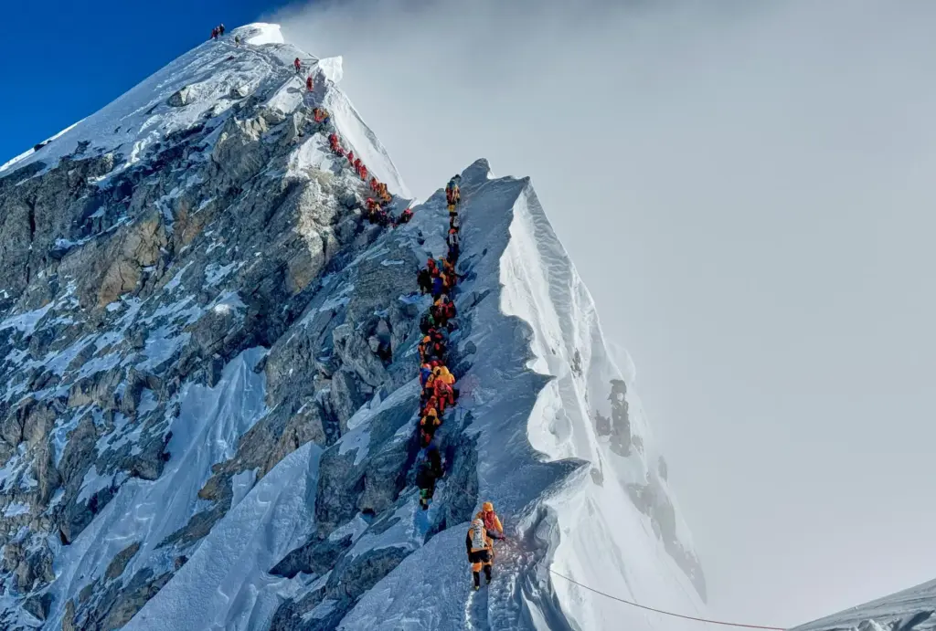 Khumbu Icefall is visible between two peak