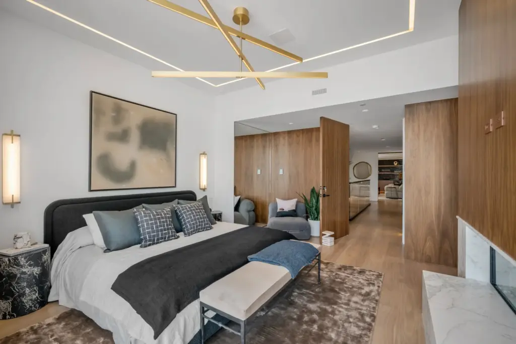 The primary suite has a fireplace and sitting area. (Photo...