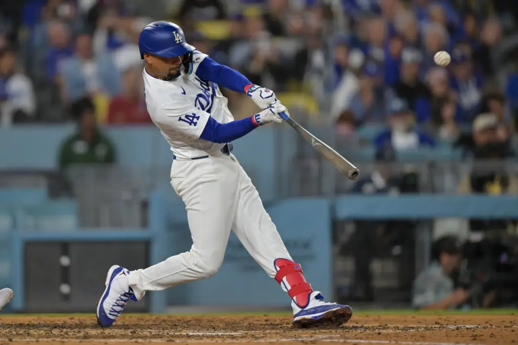 The Dodgers’ Mookie Betts hits a three-run home run during...
