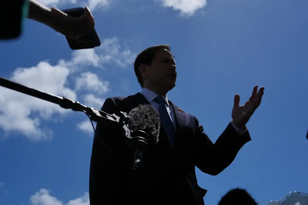 Secretary of State Marco Rubio speaks to the press before boarding his plane.