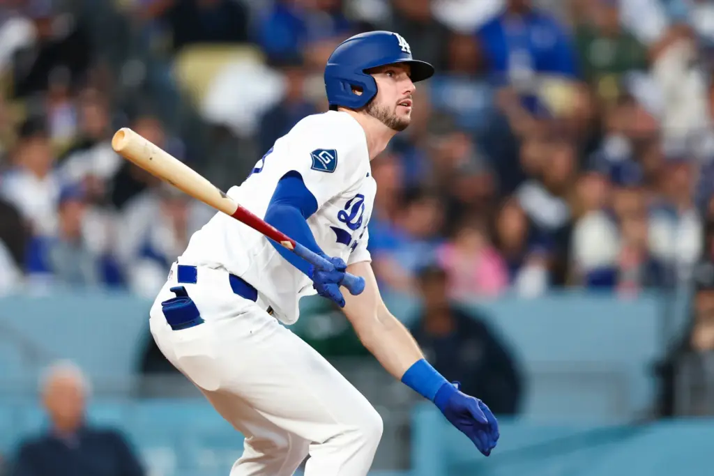 The Dodgers’ Kyle Tucker hits an RBI double during the...