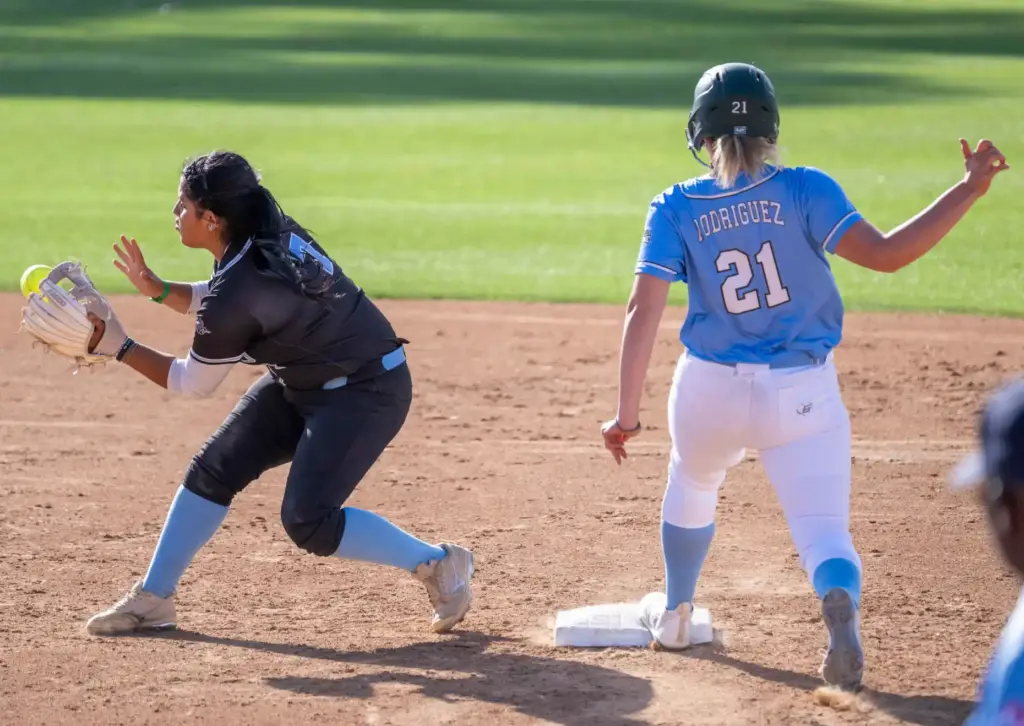 Irvineâs Finley Rodriguez gets safely to second base, before Arroyo...