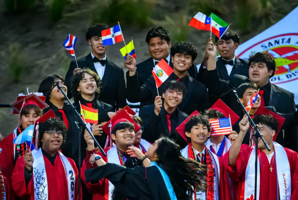 The Santa Ana High School choir perform a graduation medley...