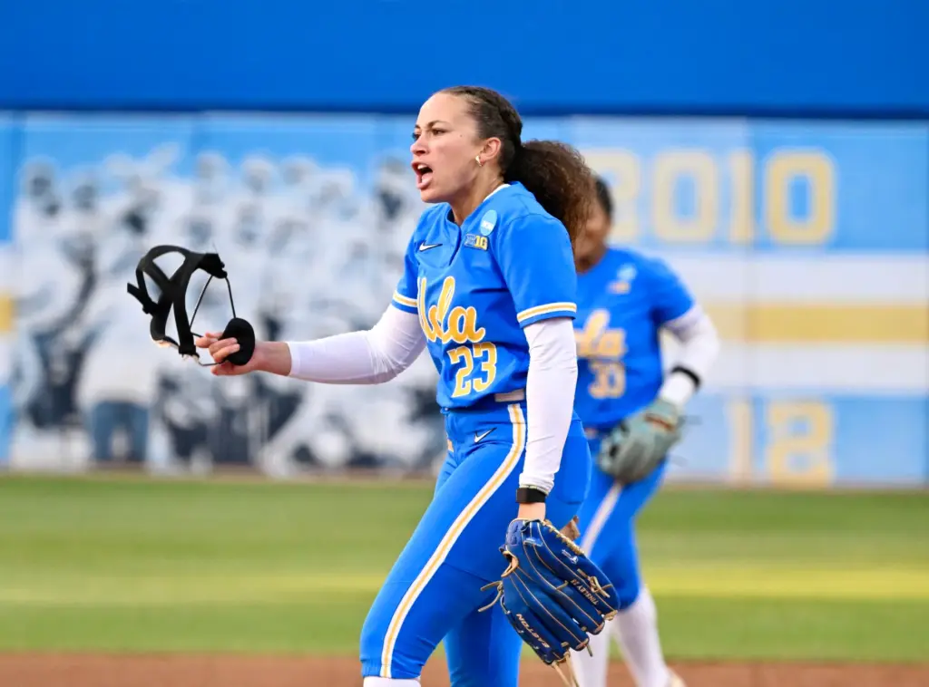 Starting pitcher Taylor Tinsley #23 of the UCLA Bruins reacts...