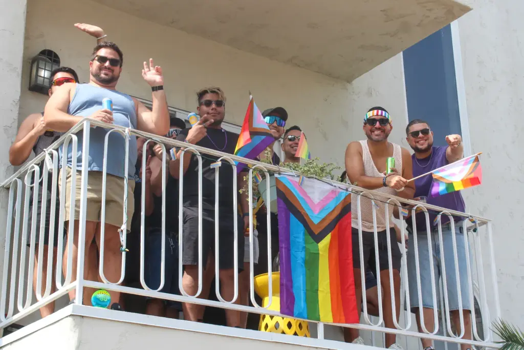 People celebrated from their balconies during the 43rd annual Long...