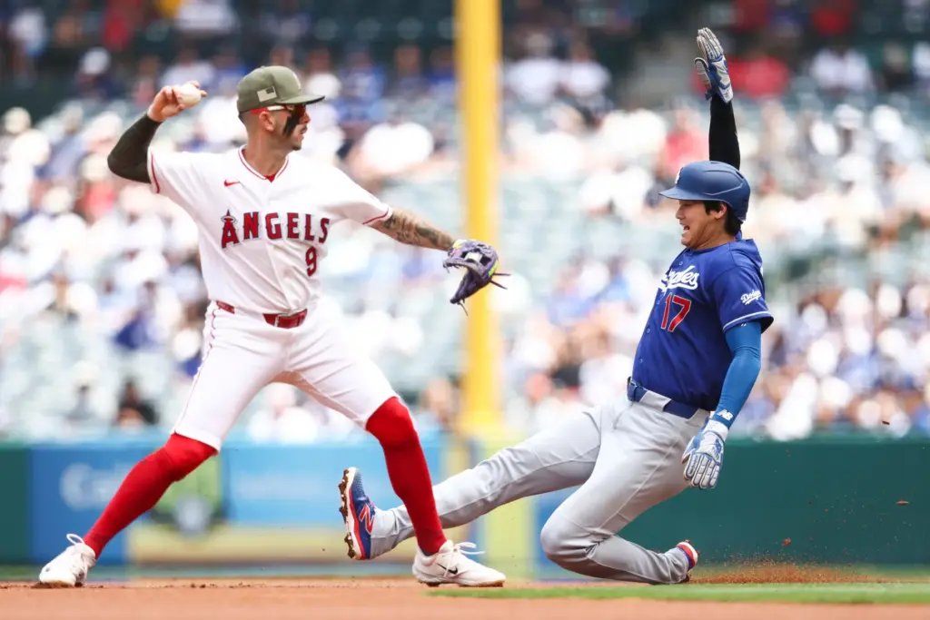 Dodgers’ Shohei Ohtani (17) slides into second base as Angels...