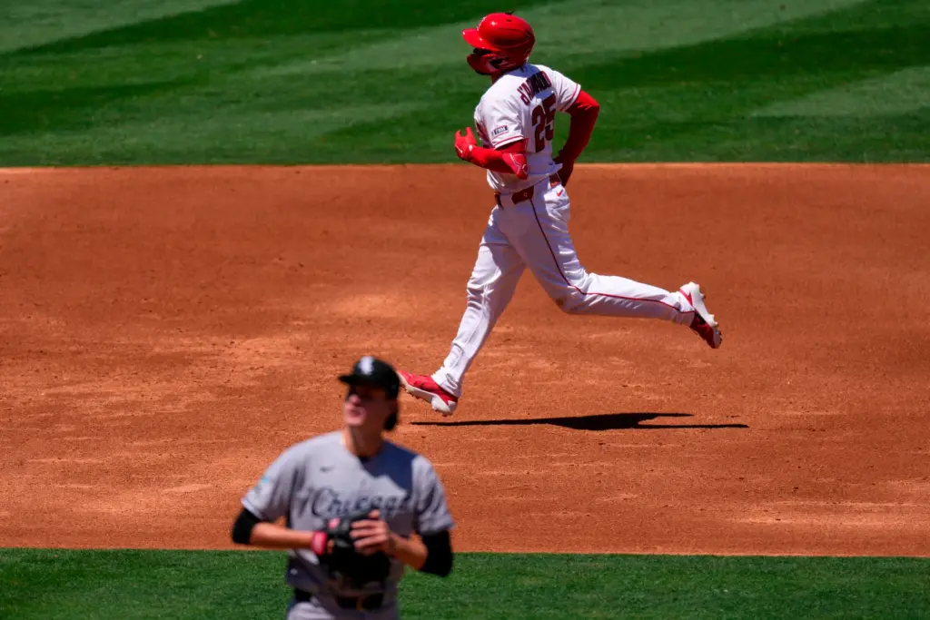 The Angels’ Travis D’Arnaud runs the bases after hitting a...