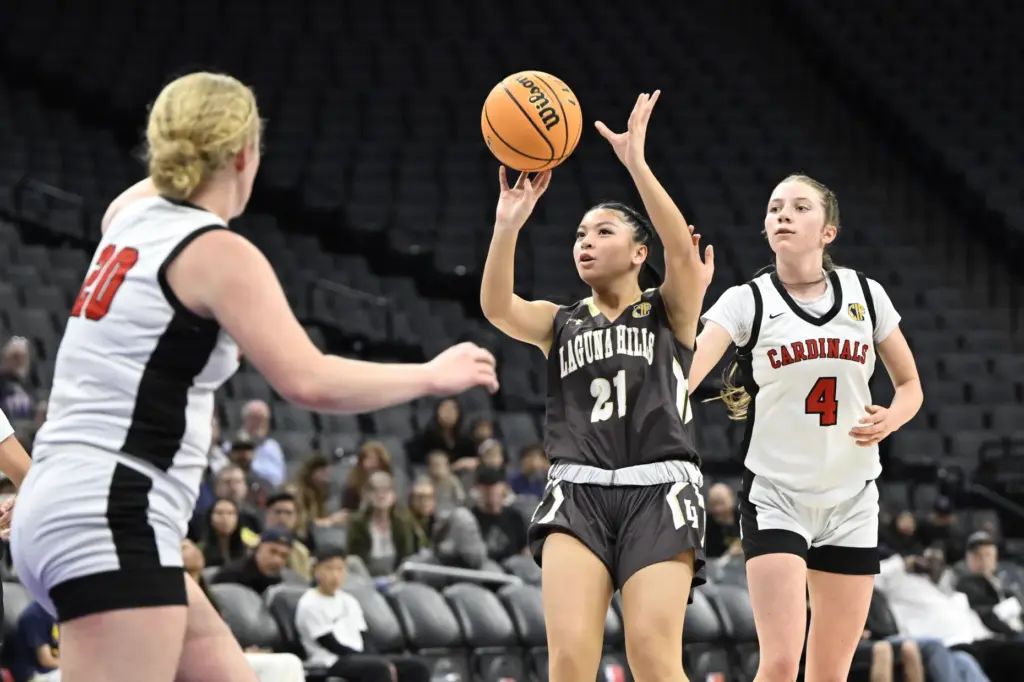 Amanda Yuson #21 of Laguna Hills shoots against Woodland Christian...