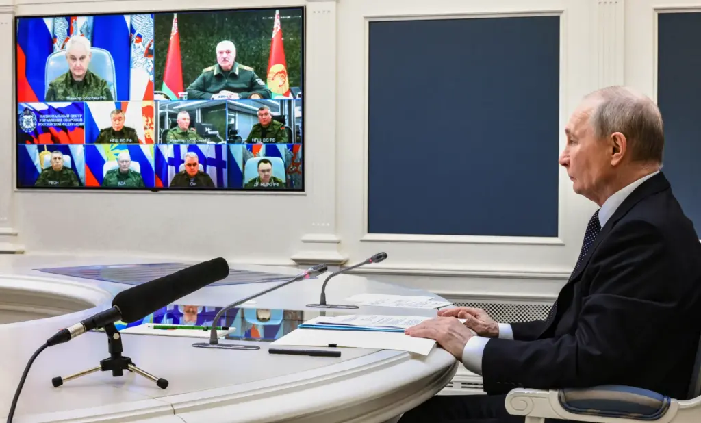 Russian President Vladimir Putin and his Belarusian counterpart Alexander Lukashenko take part in a video call.