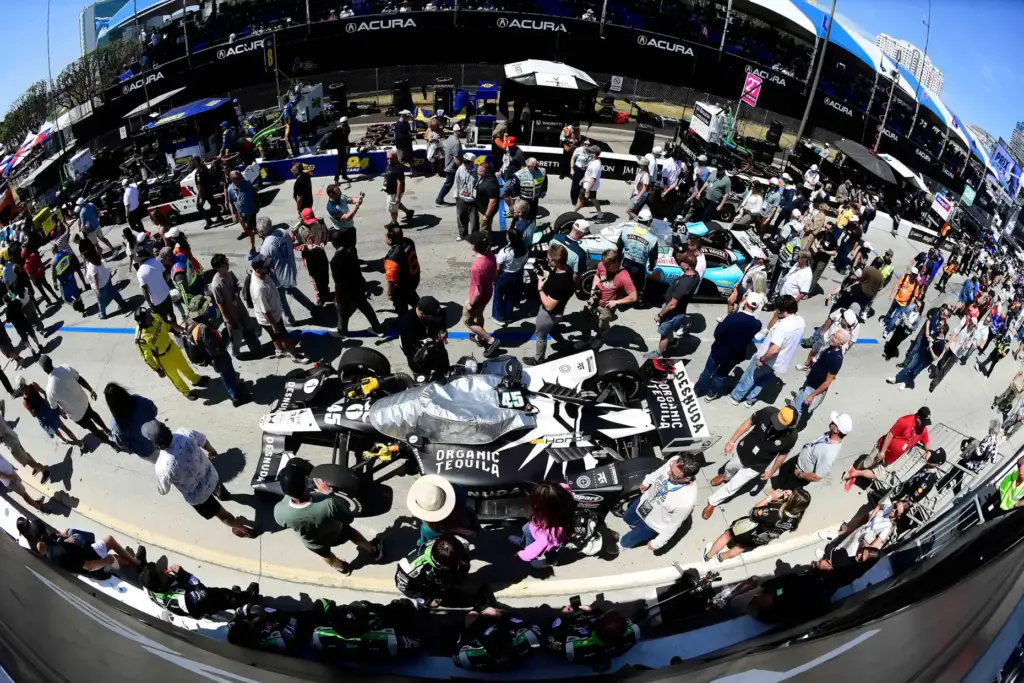 Race fans jam the pit lane prior to the 51st...