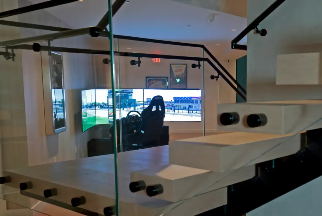 A racing simulator is available for use in the Ownerâs...