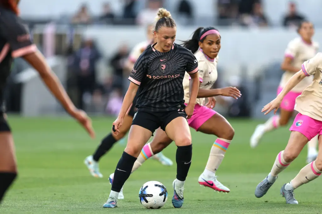 Angel City FC midfielder Kennedy Fuller controls the ball against...