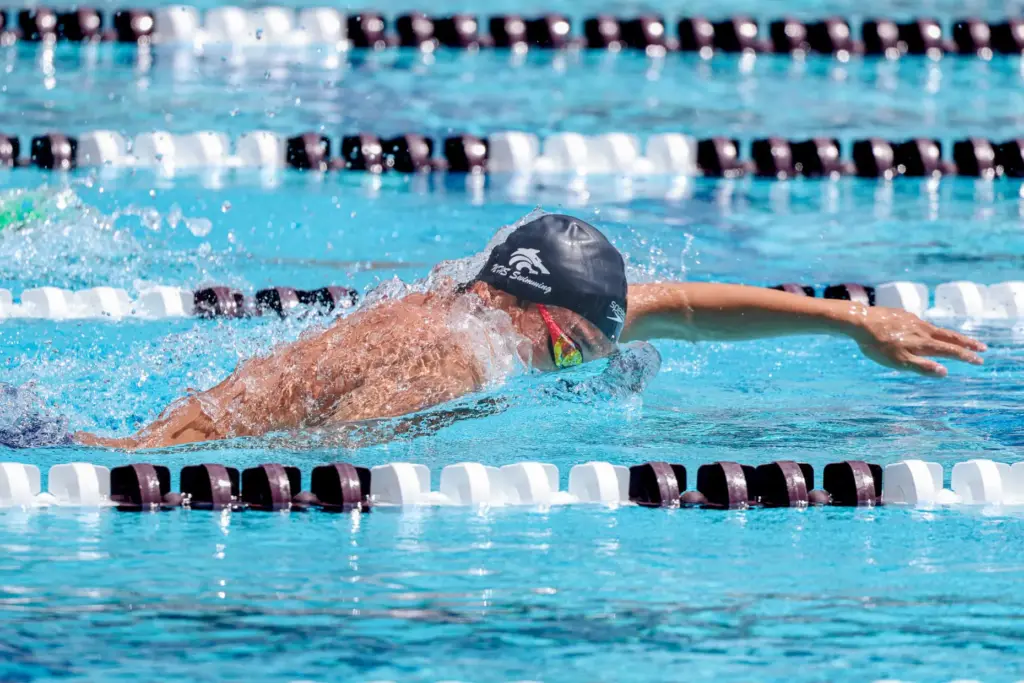 Northwood’s Andrew Maksymowski races to victory in the 500-yard freestyle...