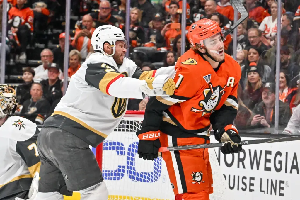 The Vegas Golden Knightsâ Brayden McNabb (3) shoves the Ducksâ...