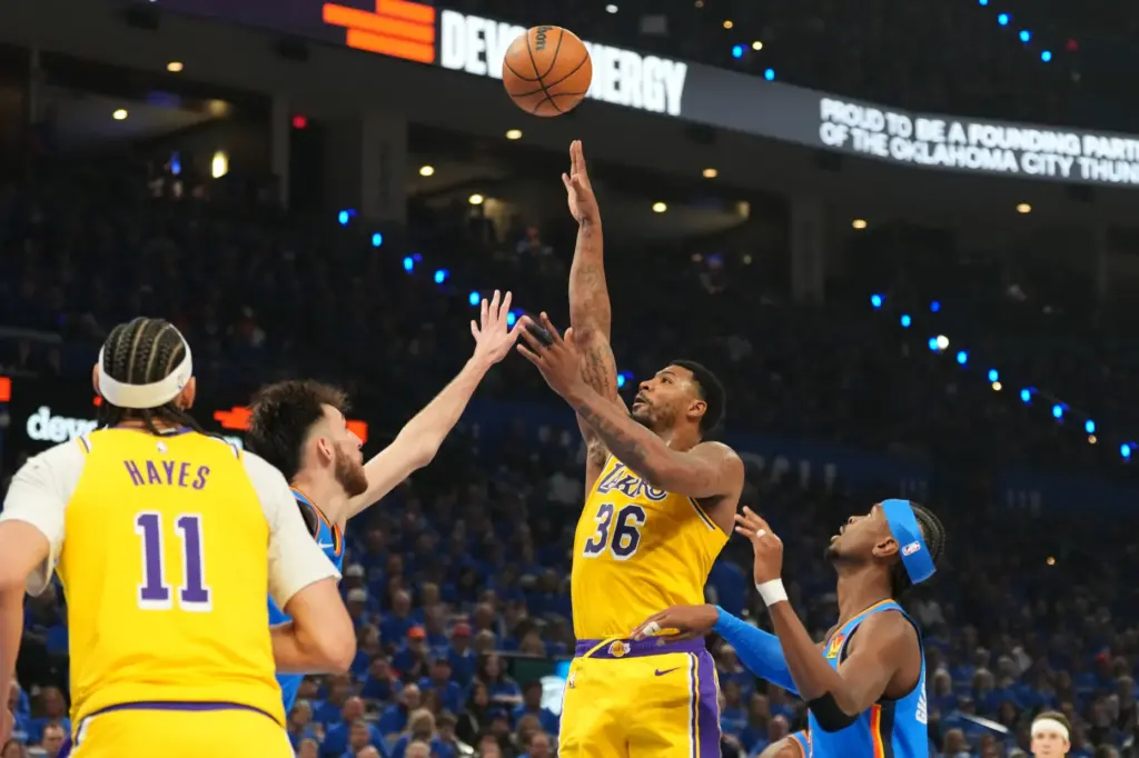 Lakers guard Marcus Smart shoots over Oklahoma City Thunder forward...