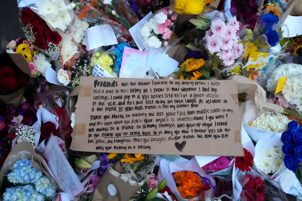 A makeshift memorial for Matthew Perry is seen outside the...