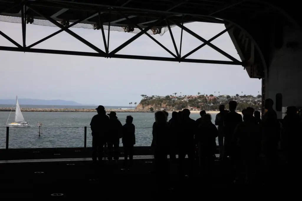 Visitors tour the Hangar Bay of the USS Essex on...