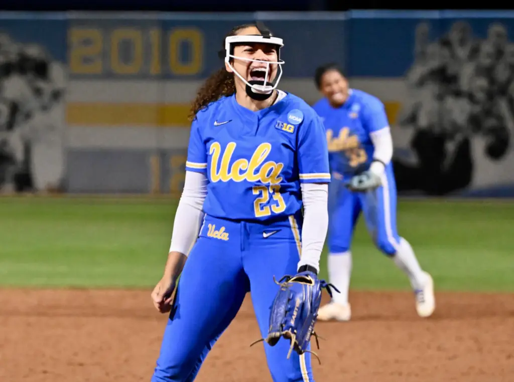 Starting pitcher Taylor Tinsley #23 of the UCLA Bruins reacts...