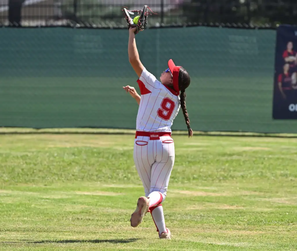 Second baseman Rylee Cull #9 of the Whittier Christian Heralds...