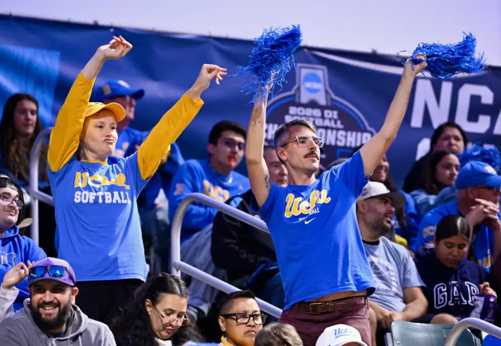 UCLA fans celebrate after a run scores against the UCF...