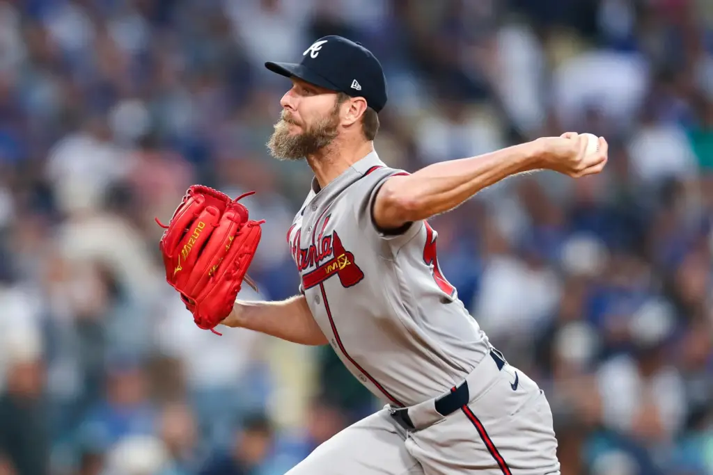 Atlanta Braves starting pitcher Chris Sale throws to the plate...