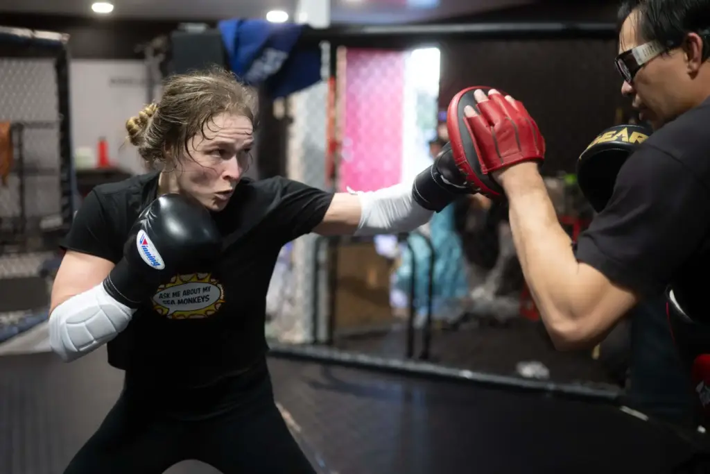 Former UFC champion and Olympic medalist Ronda Rousey prepares for...