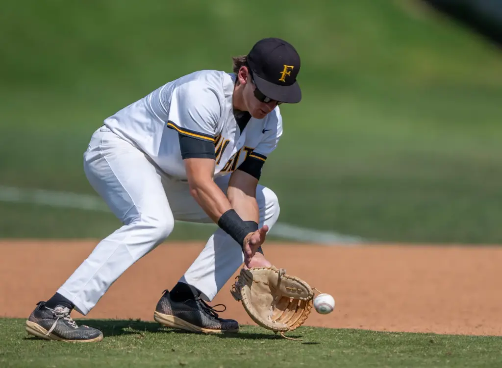 Foothill first baseman Jaxon Foshay fields the ball during a...