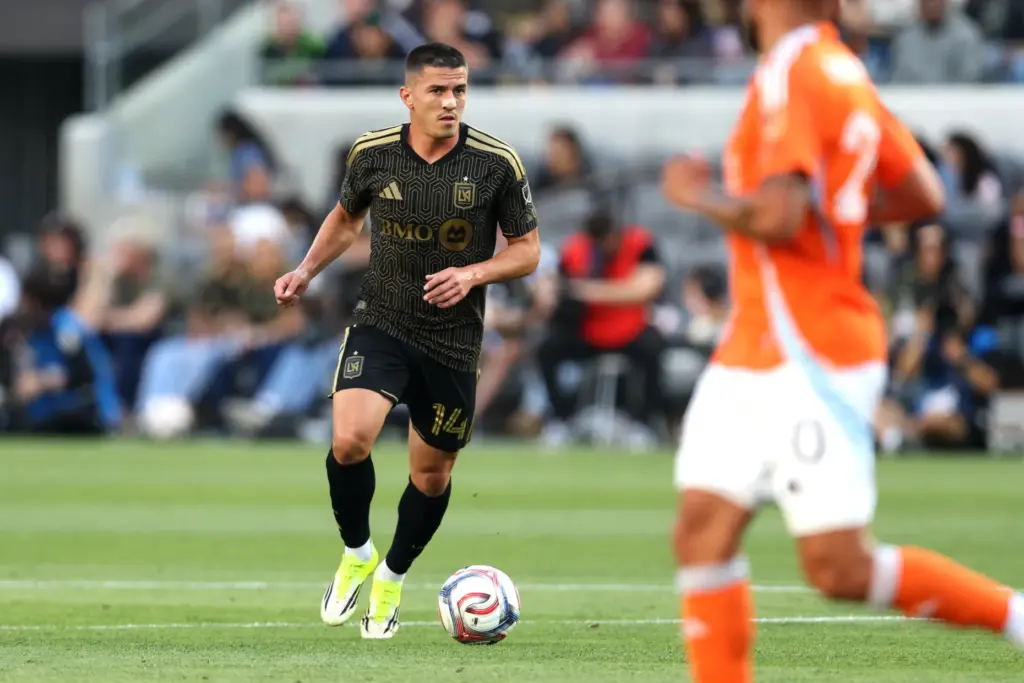 Los Angeles FC defender Sergi Palencia moves the ball against...
