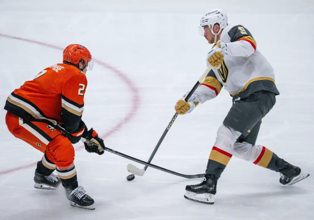 The Vegas Golden Knightsâ Jack Eichel, right, takes a shot...