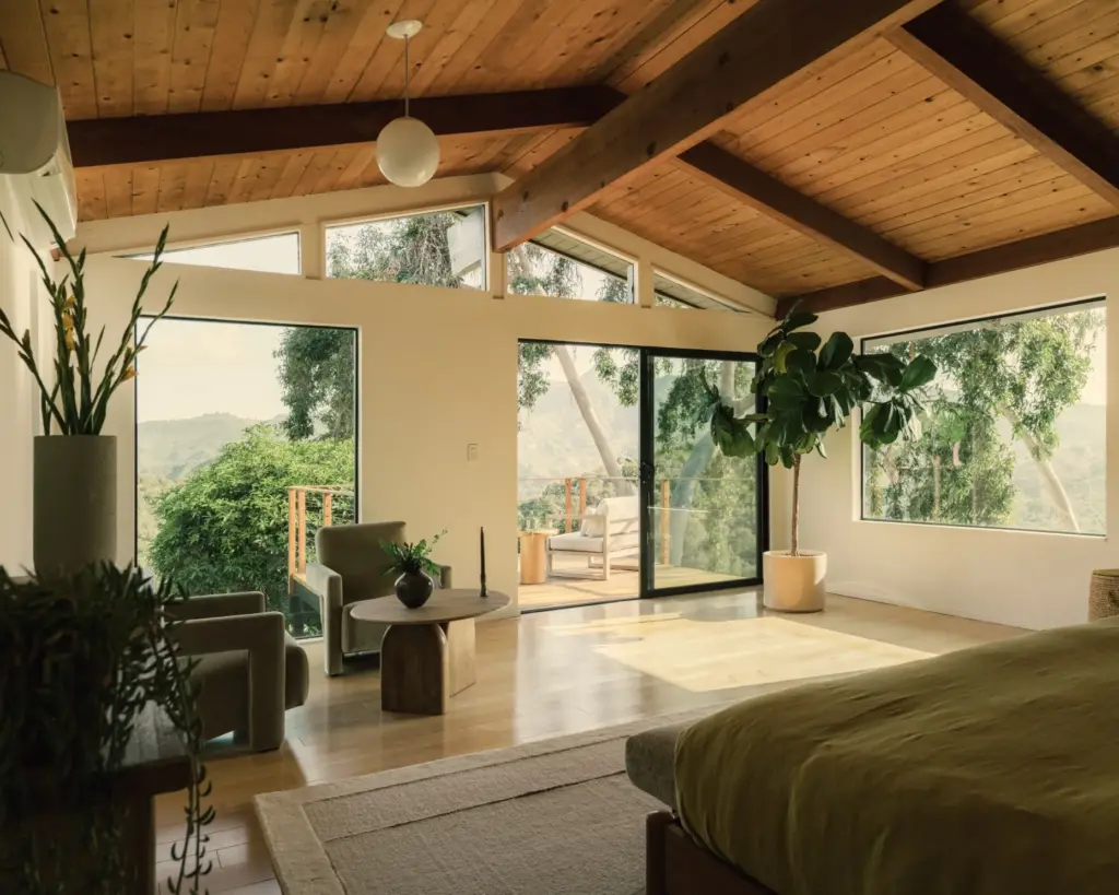 The primary bedroom opens to a private balcony. (Photo by...