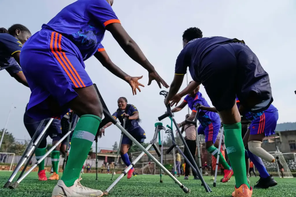 Soccer players on the Rwanda Amputee team take part in...