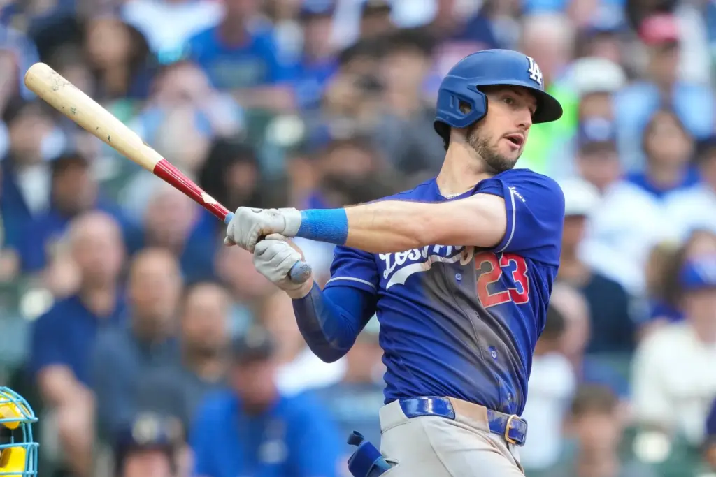 Dodgers’ Kyle Tucker hits a two-RBI triple during the fifth...