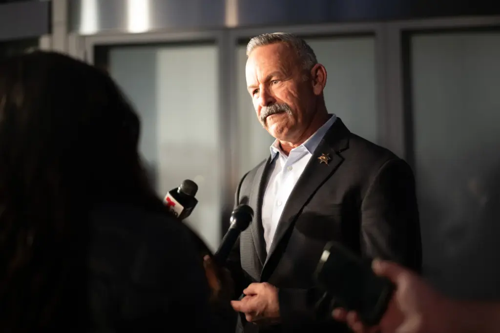 Gubernatorial candidate Chad Bianco talks with media after a debate...
