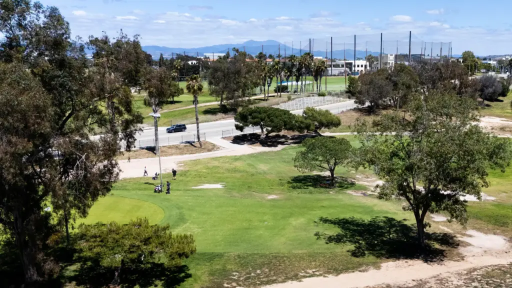 Golfers play at Newport Beach Golf Course in Newport Beach...