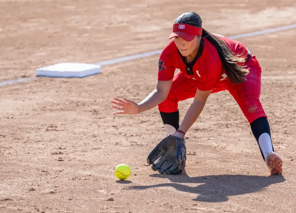 Whittier Christian third baseman Sofia Hernandez fields the ball during...
