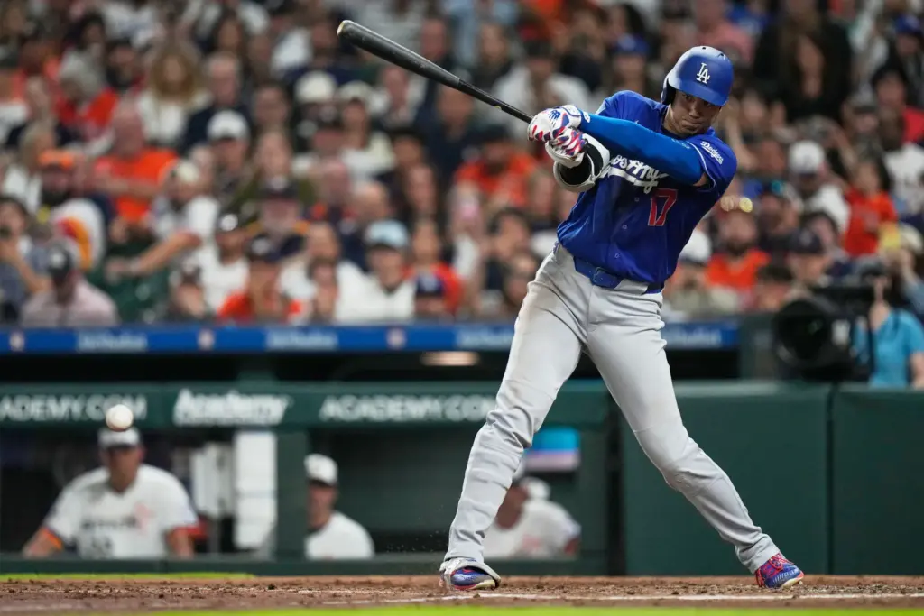 Dodgers designated hitter Shohei Ohtani hits into a fielder’s choice...