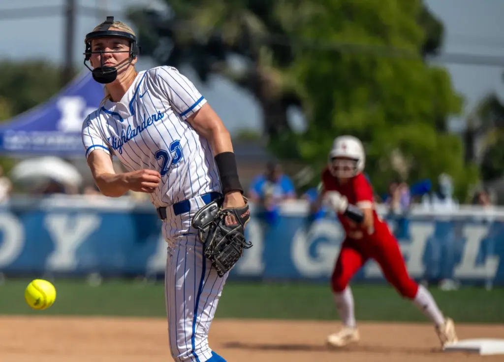 La Habra starting pitcher Madison Payne throws to home plate...