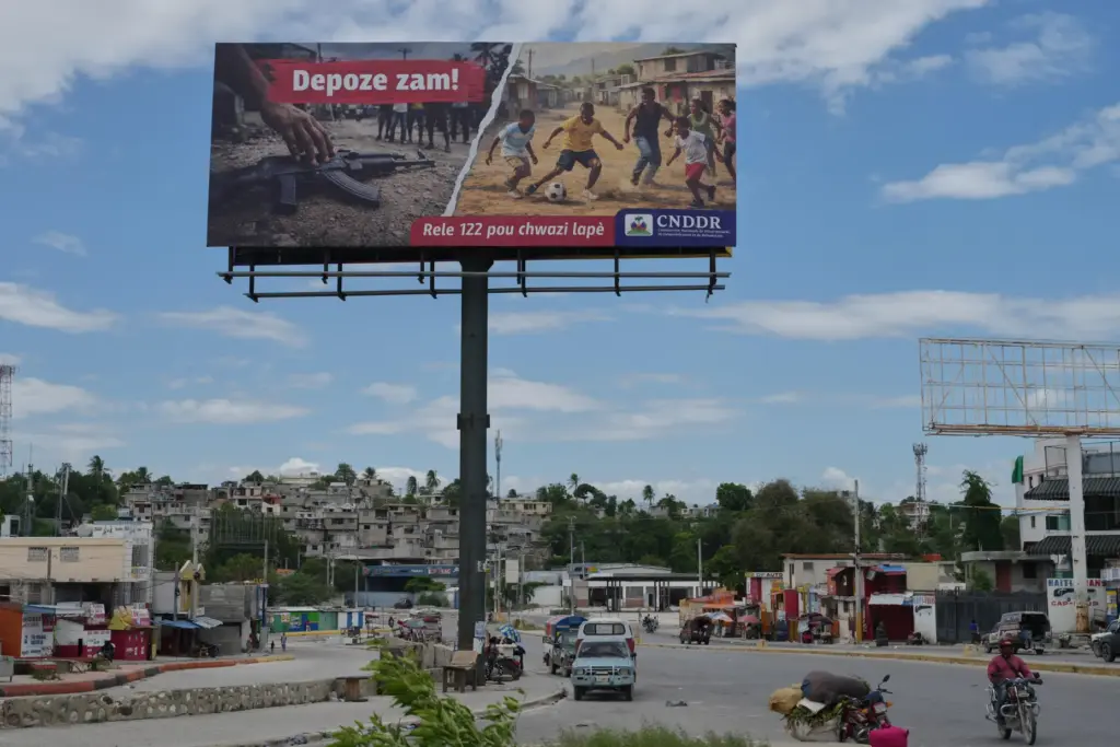 A billboard installed as part of a government disarmament campaign...