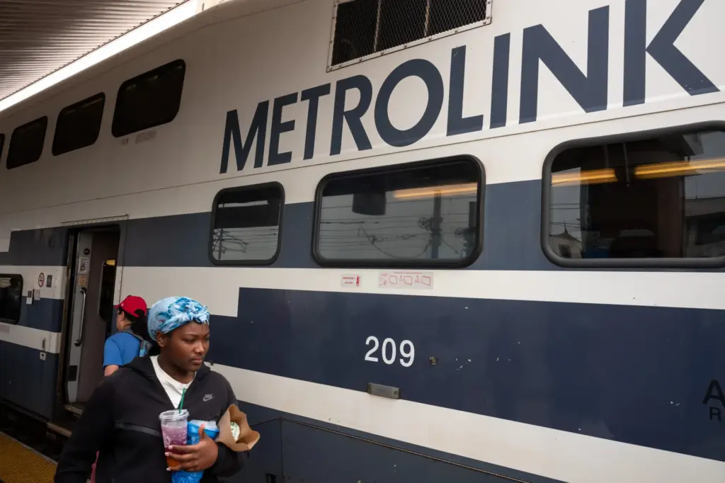 Passengers board the Metrolink train for Lancaster at Union Station...