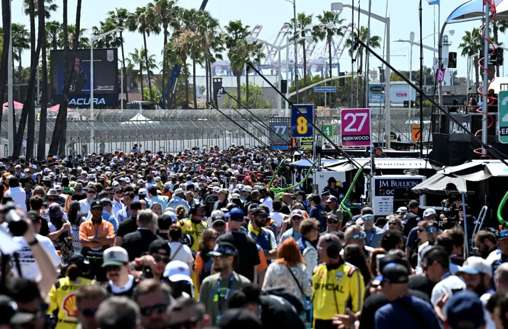 Pit lane is filled with race fans prior to the...