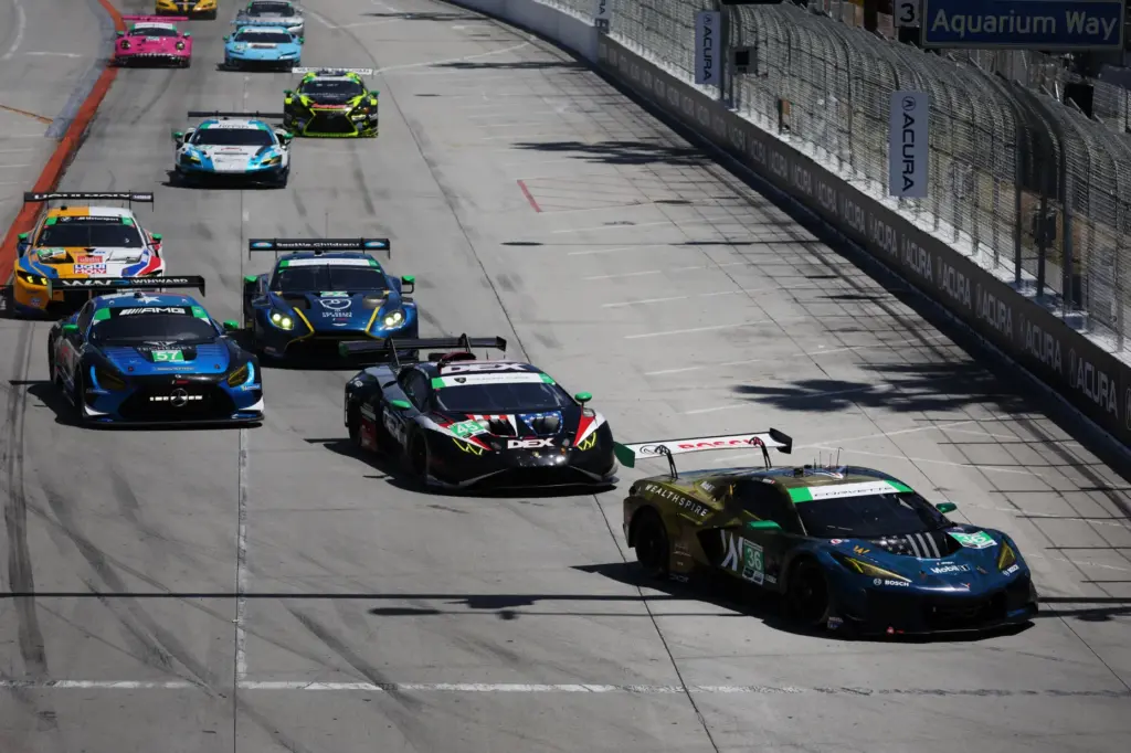 The DXDT Racing (36) car leads the GTD field into...
