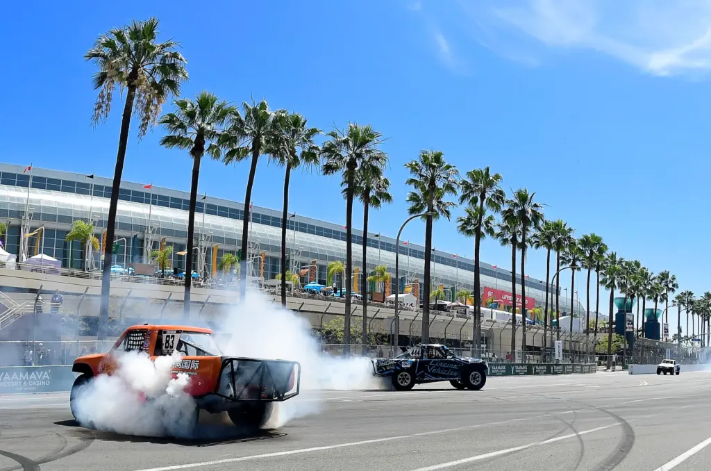 Stadium Super Trucks driver and race winner Matt Brabham, left,...