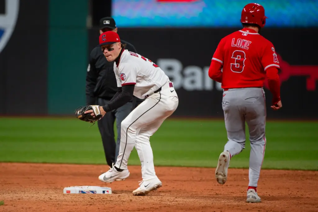 The Cleveland Guardians’ Travis Bazzana, left, forces out the Angels’...