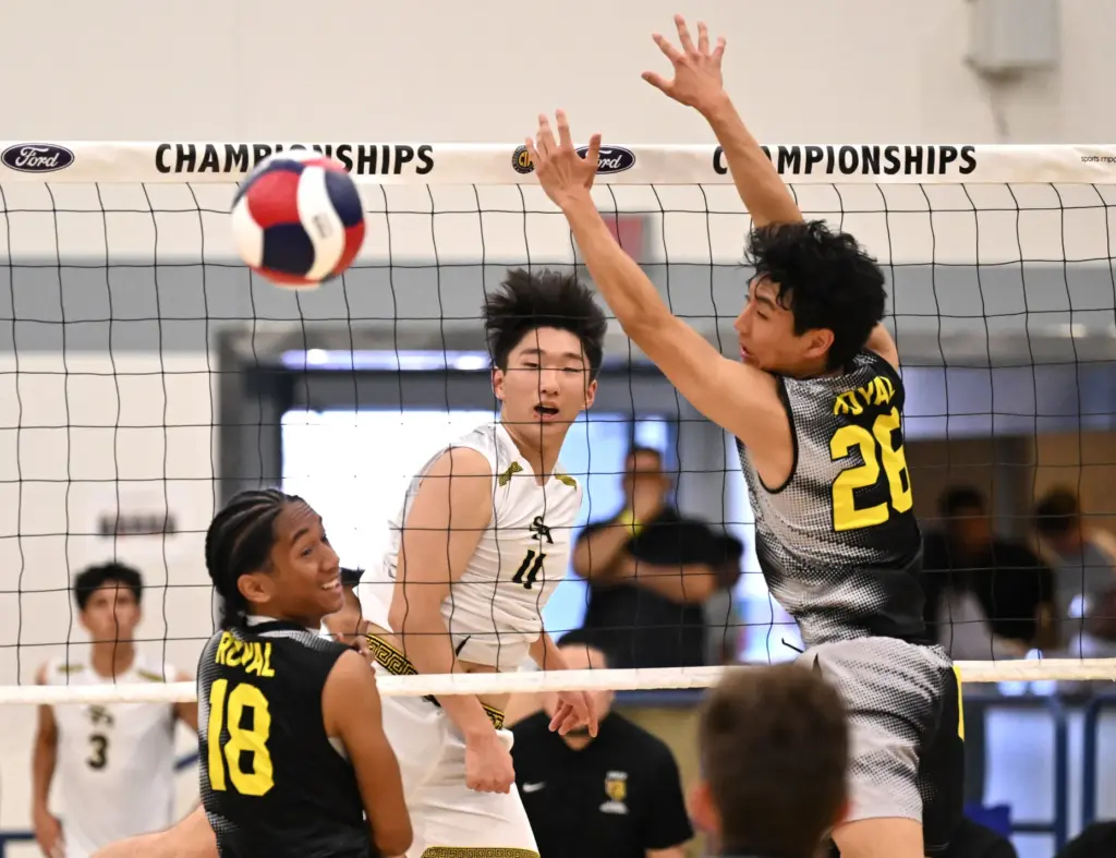 Christian Lee #11 of the Sunny Hills Lancers shoots beteen...