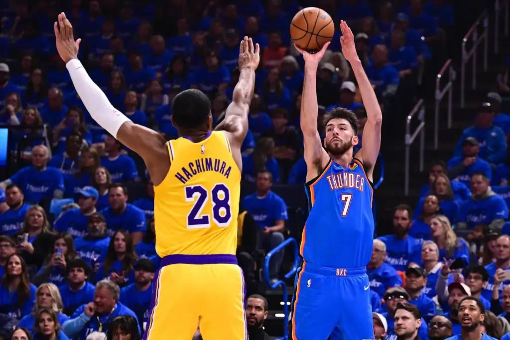 Oklahoma City Thunder forward Chet Holmgren takes a shot as...