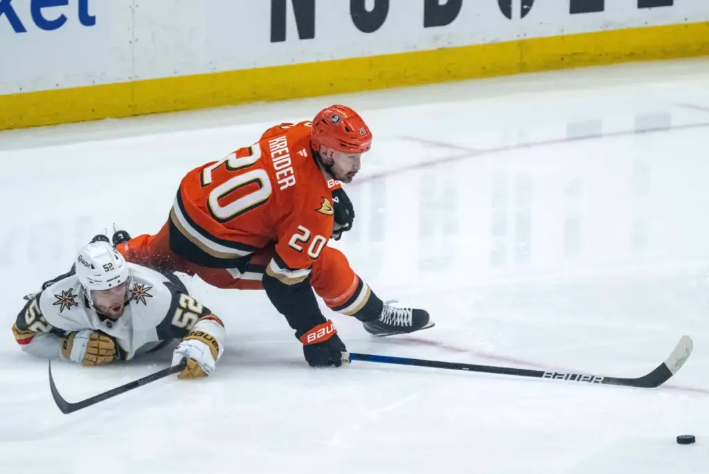 The Ducksâ Chris Kreider, right, and the Vegas Golden Knights’...